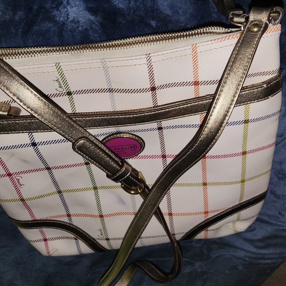 A coach coated canvas crossbody in tattersall plaid